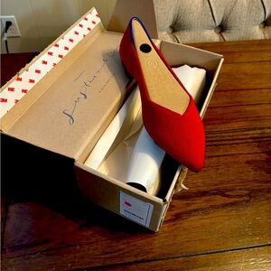 New never worn Rothy’s red flats. Size 7.5